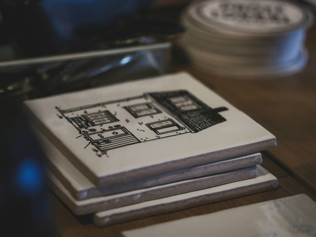 Diagram showing how liquid penetrates untreated vs. sealed cardboard coasters