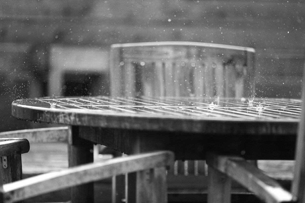 Infographic showing how moisture penetrates unsealed coasters and damages wood surfaces within 5-15 minutes