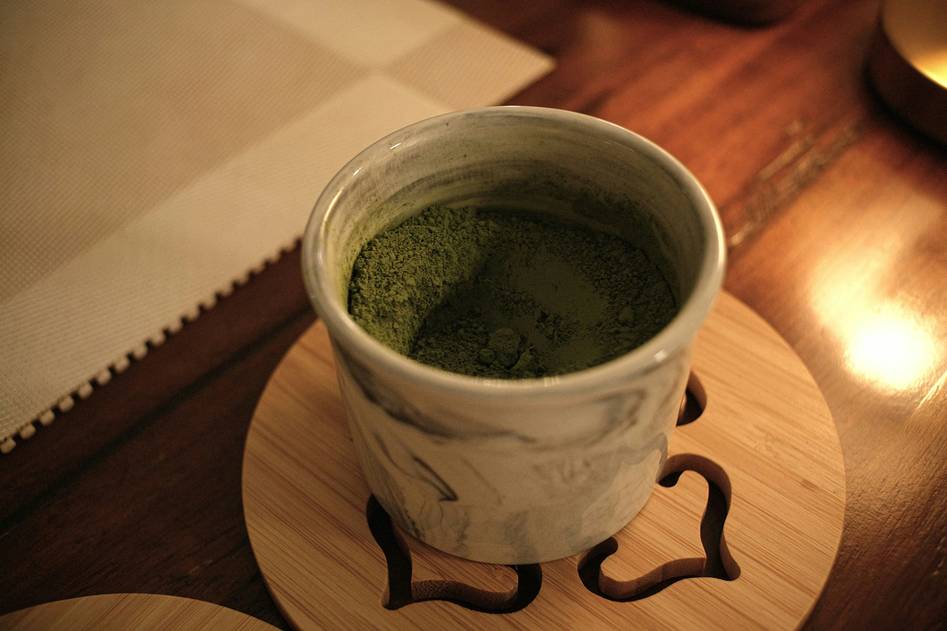 Modern coaster collection on wooden surface